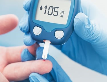 Caregiver supporting a client with diabetic care